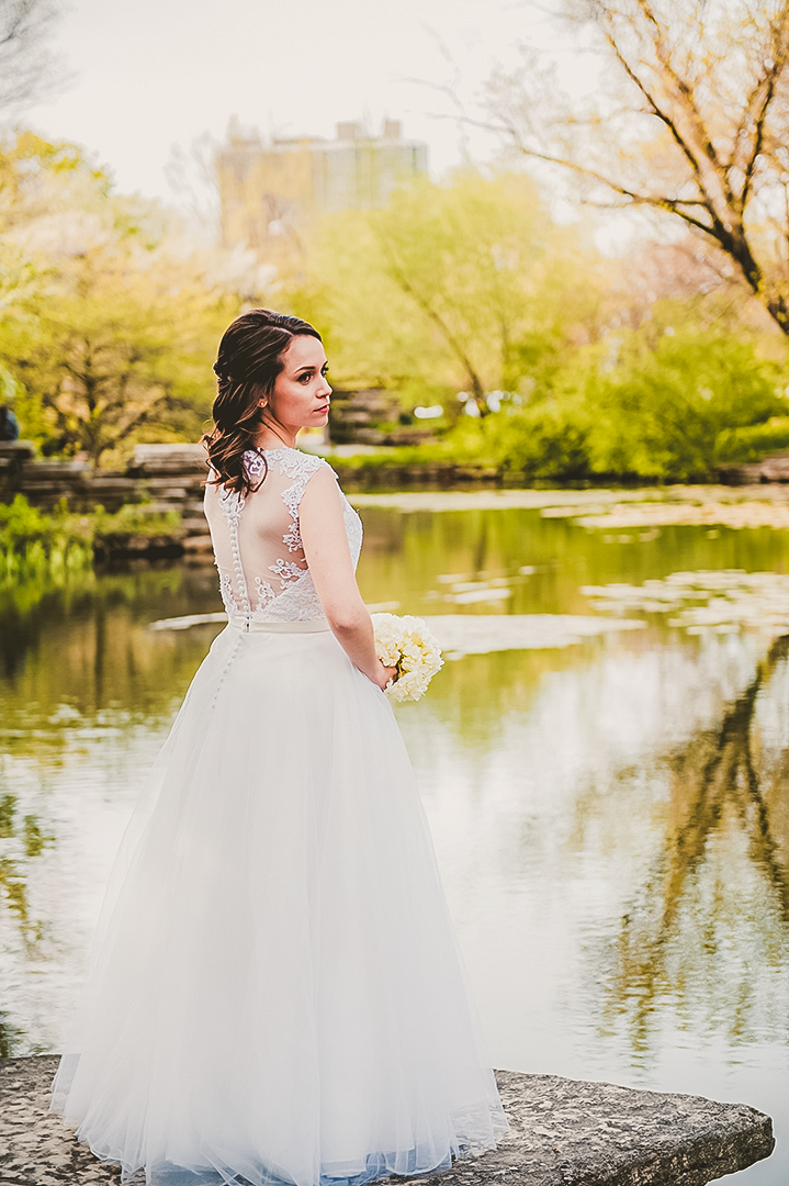 newlywed standing in front of The Chicago Lily Pond