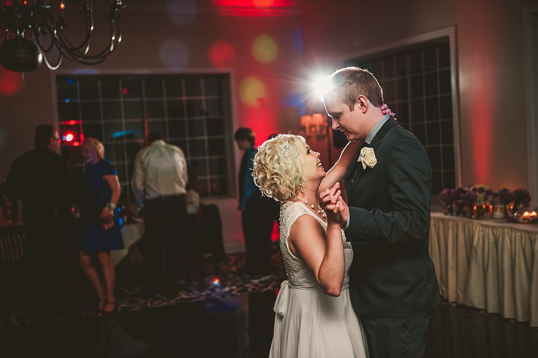 a bride and groom experiencing their first dance at the Naperville Country Club