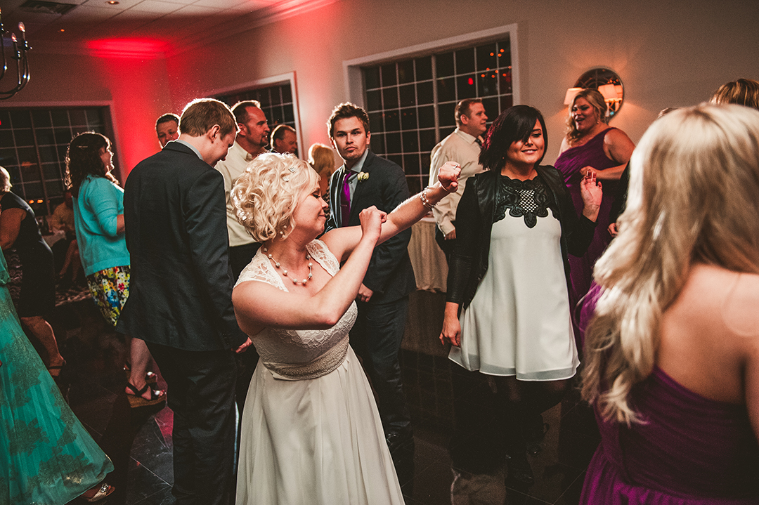 bride dancing at her wedding reception in Naperville