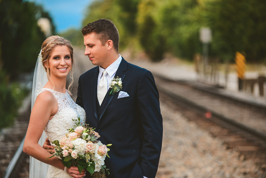 A groom checking out his wife at their Plainfield wedding.