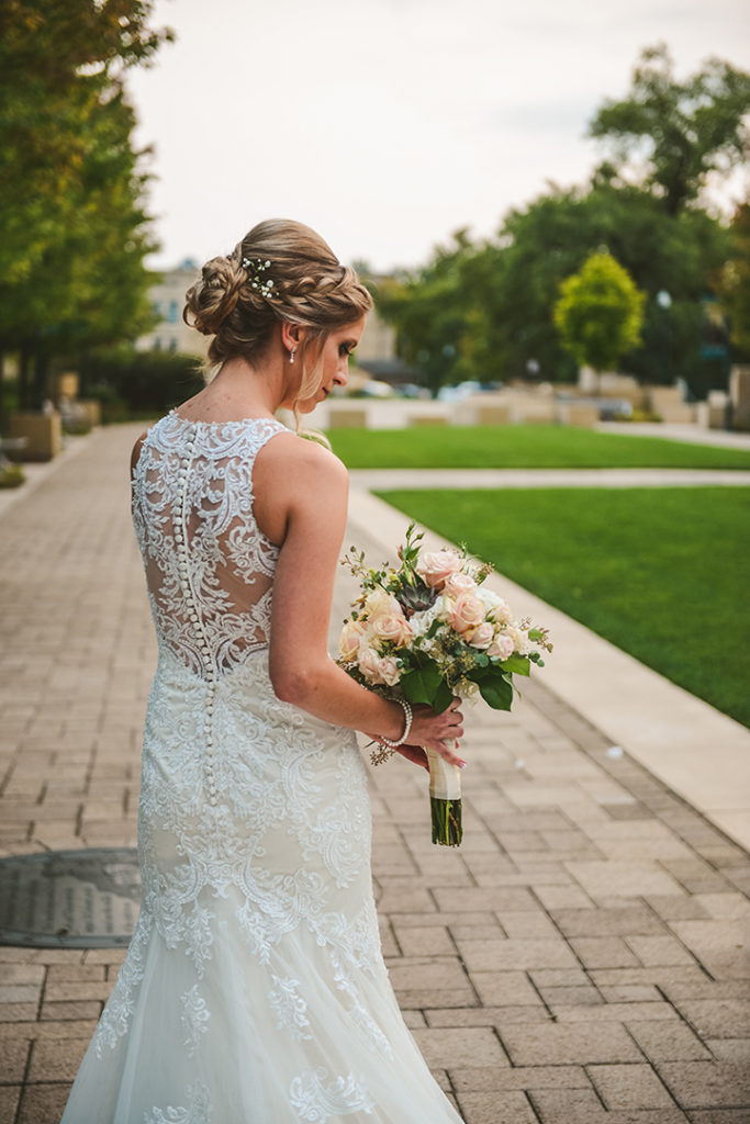 A beautiful lace wedding dress at a wedding in Naperville Illinois.