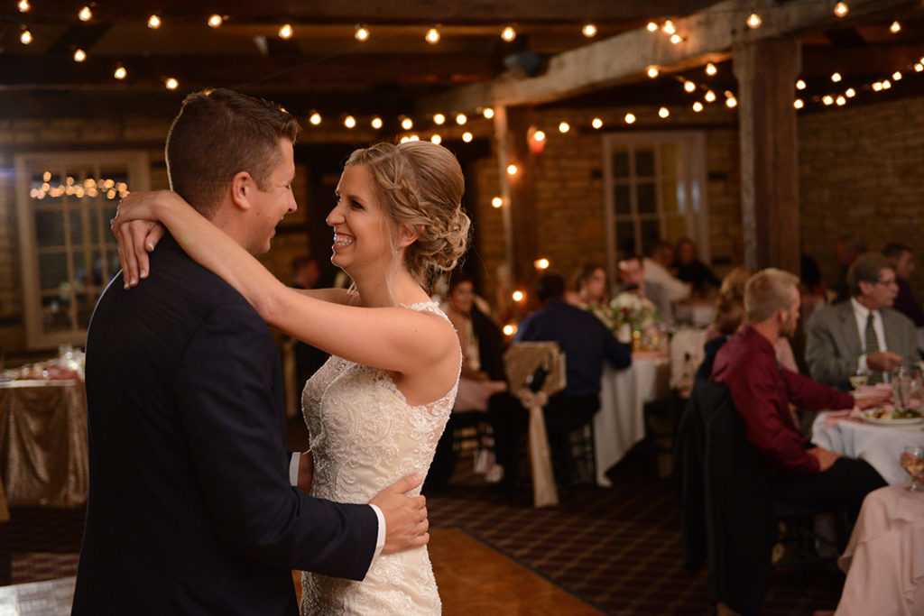 A bride and groom dancing during their first dance in Naperville.