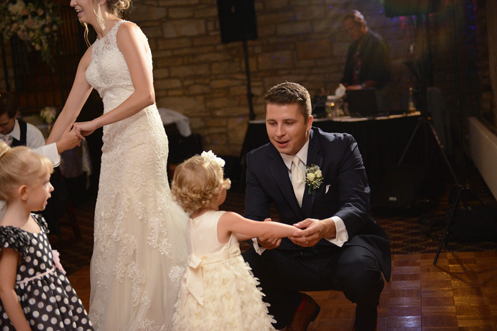 A groom dances with his daughter at a wedding at the Public Landing in Lockport.