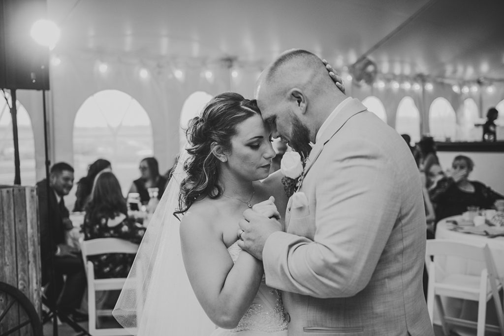 a husband and wife dancing during their first dance at their Northfork Farm Wedding