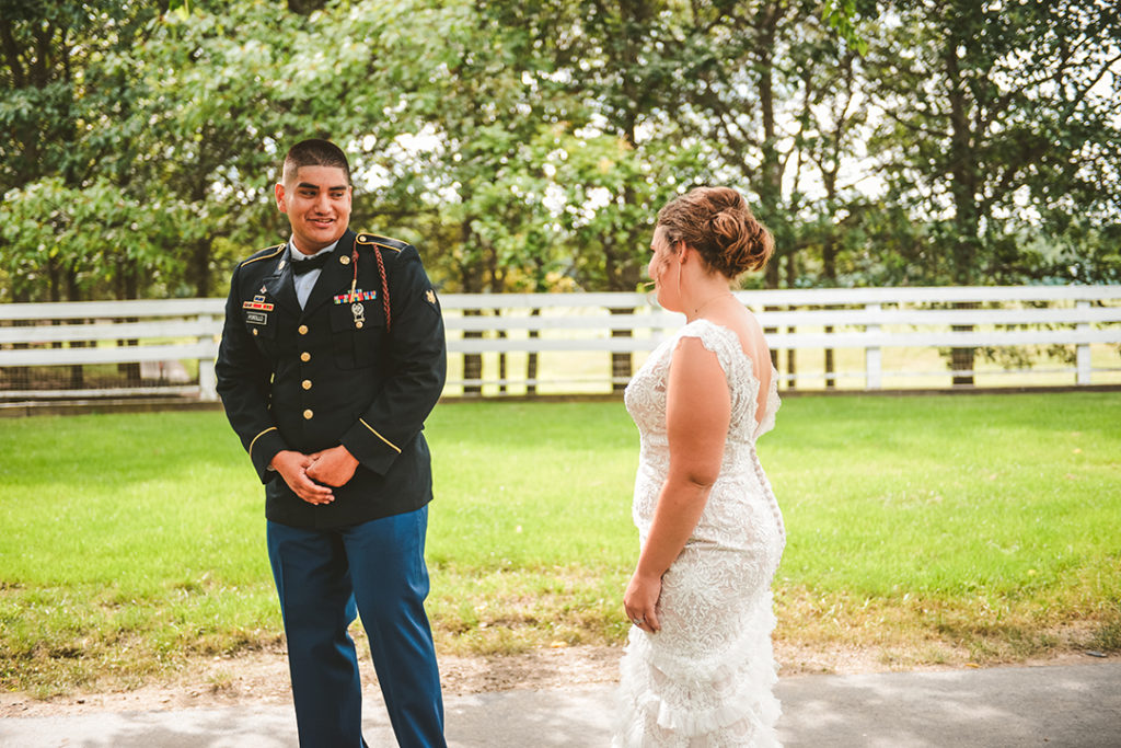 a groom turning around to see his bride for the first time during their first look