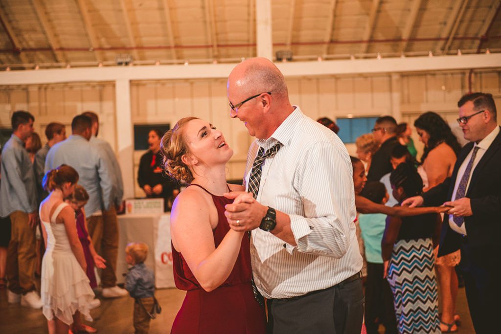 a girl and her father dancing at a Olympia Fields wedding reception