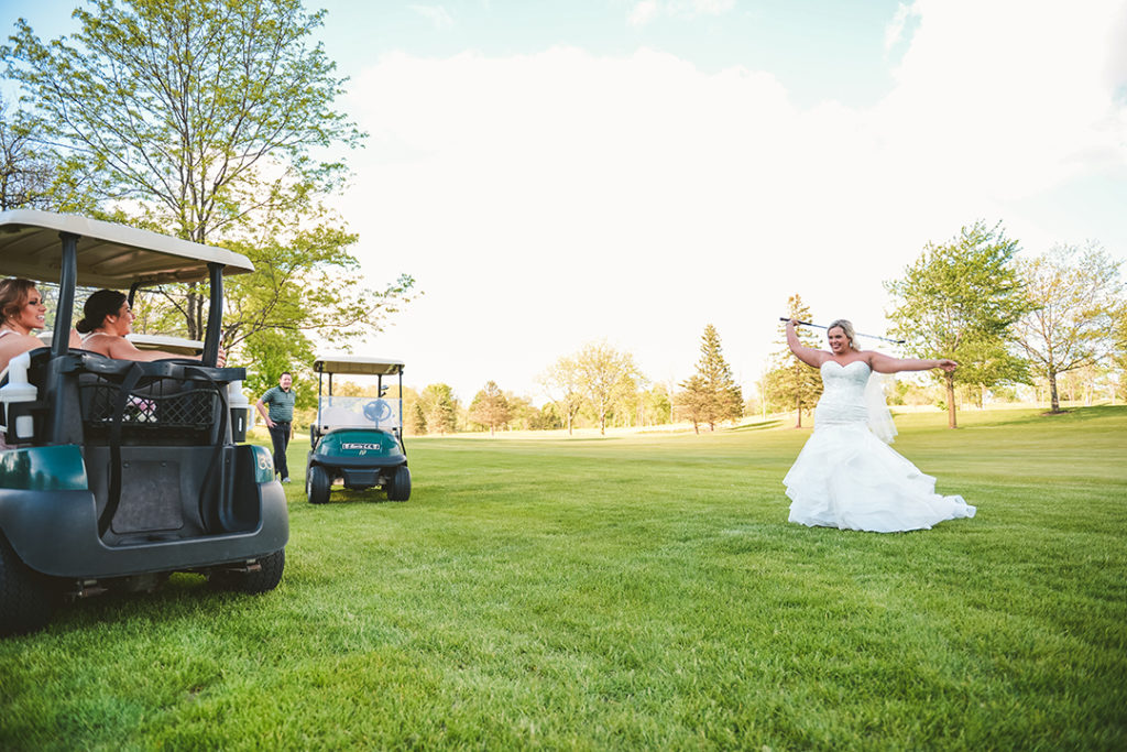 two bridesmaids laughing at the bride golfing at the Morris Country Club