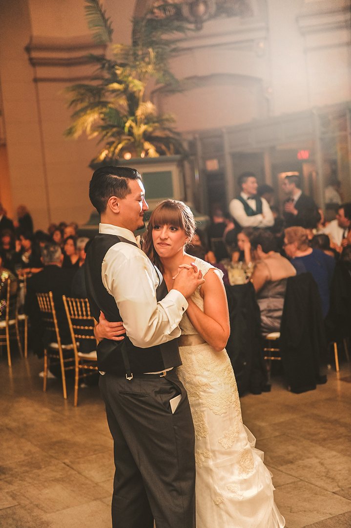 a bride and groom experiencing their first dance at the Joliet Union Station