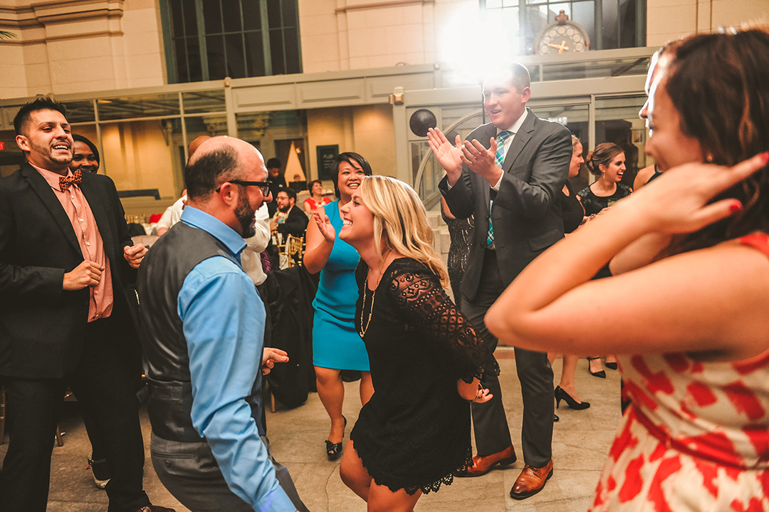 a woman dancing with her husband at a Joliet Union Station reception