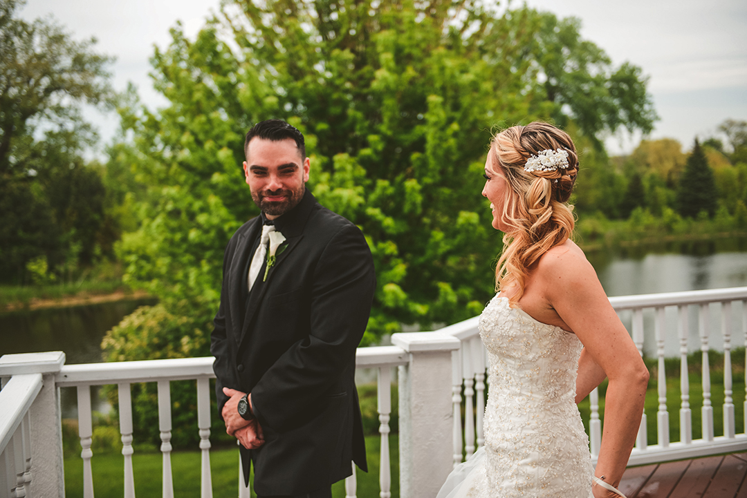 the groom turning around to see his bride for the first time in Oak Forest