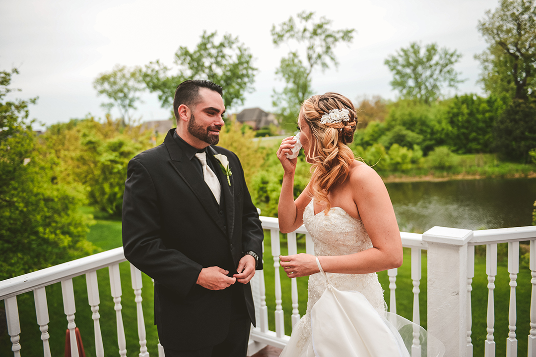 a bride crying after their first look in Oak Forest