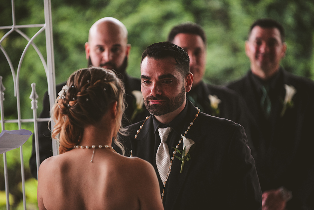 the groom looking at his bride during their wedding