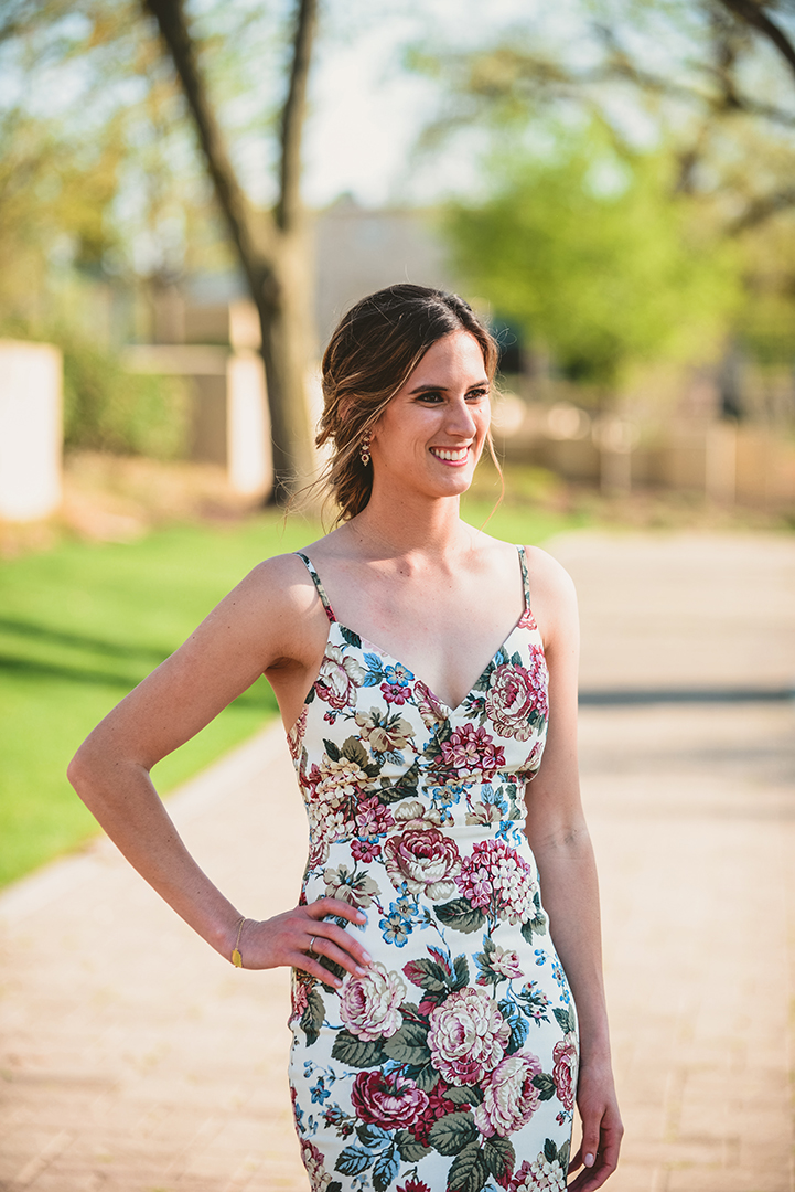 a bride standing sassy in her floral dress at her Chicago elopement