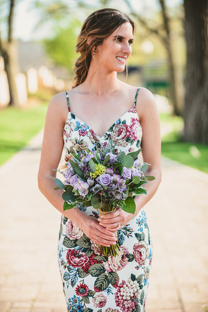 a bride standing in her floral dress at her Chicago elopement