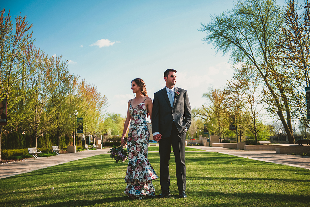 a man and a woman standing in golden light at a Chicago elopement