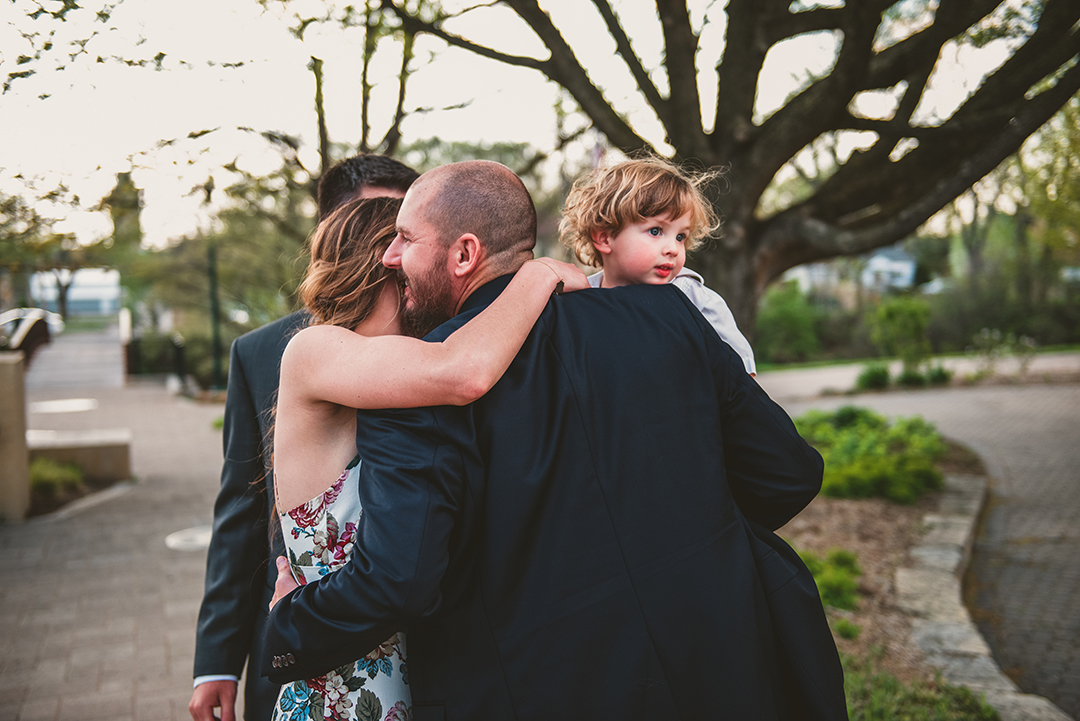 the brother of the bride saying hello to the wedding couple at a Chicago elopement