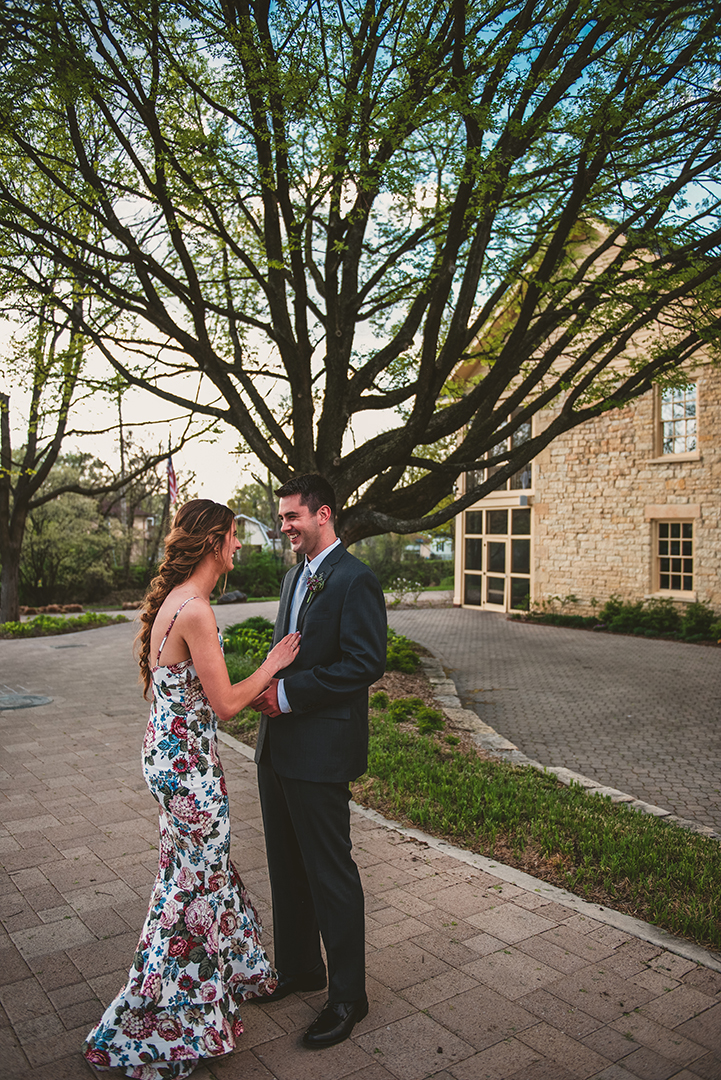 a wedding couple laughing outside of the Public Landing in Lockport