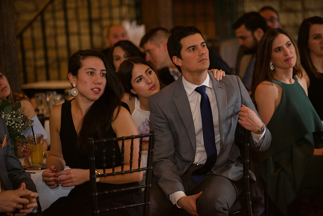 wedding guests watching at a bride and groom gets married at a Chicago Elopement