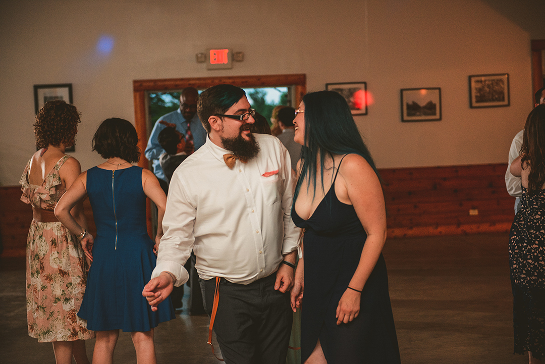 a couple dancing on the dance floor at All Season Orchard in Woodstock