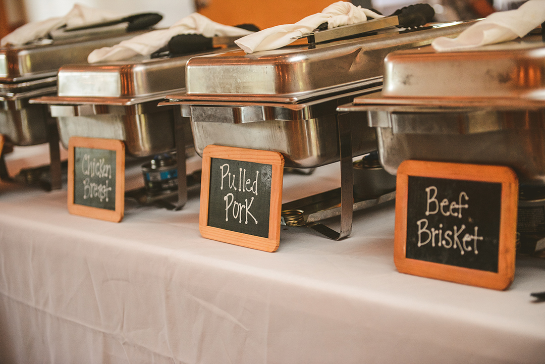 the buffet with pulled pork and brisket from Porkies of Woodstock at a wedding reception