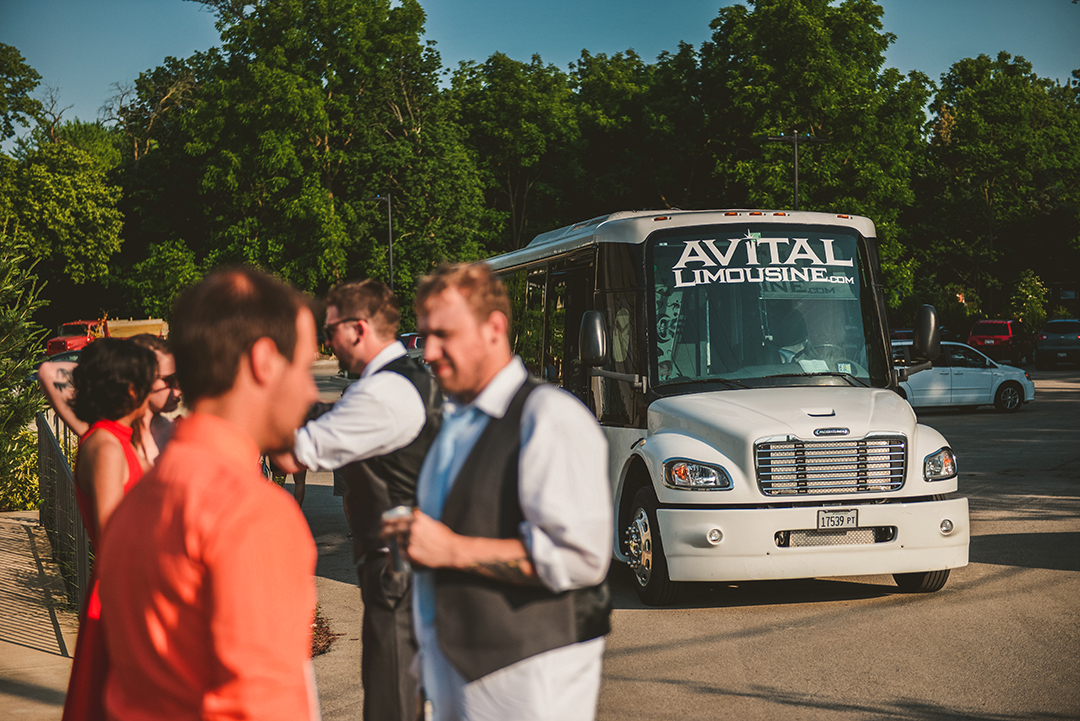 avital limousine party bus dropping off the bridal party at Warehouse 109