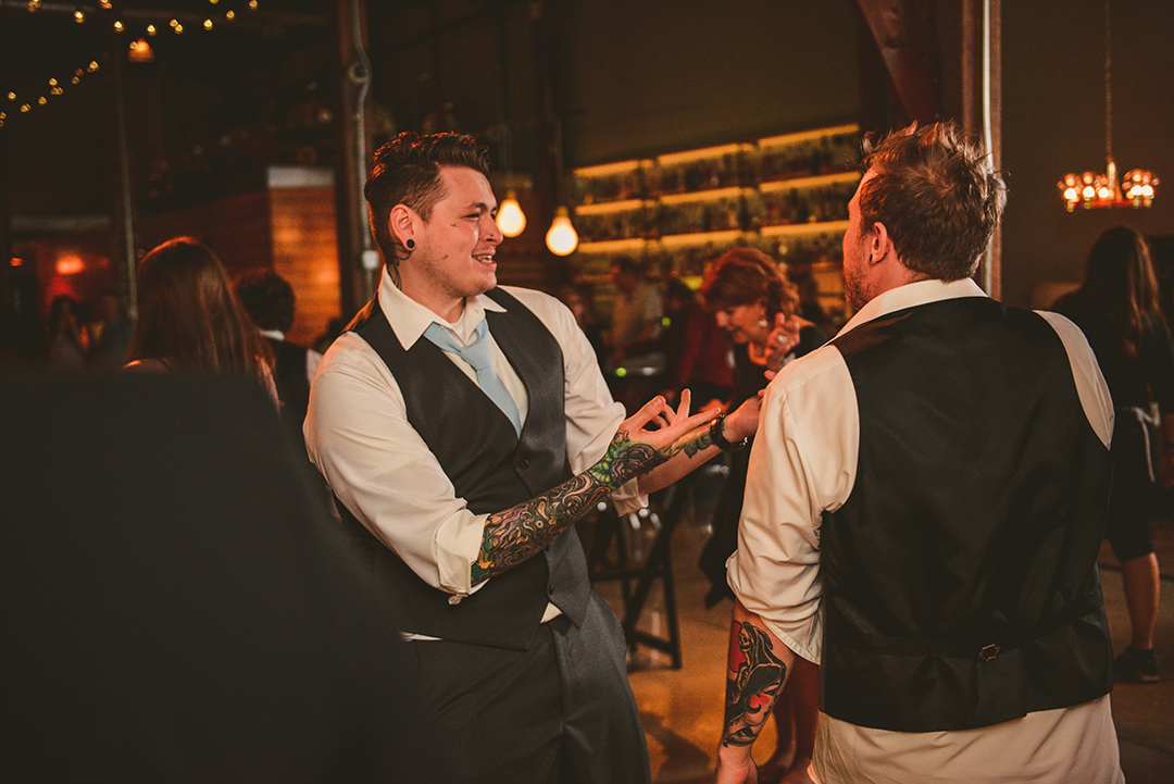 best man and groomsman dancing at a Plainfield wedding reception