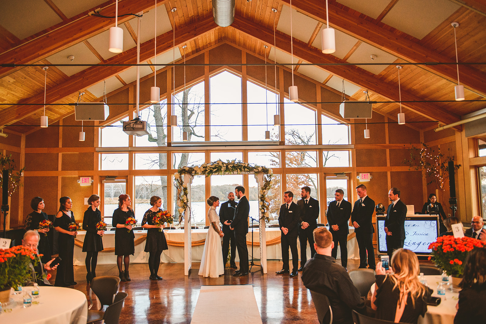 a wide shot of a wedding taking place at the Four Rivers Environmental Education Center in Channahon
