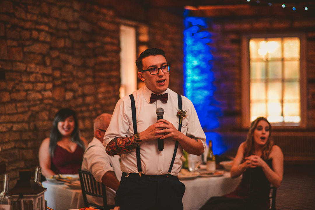 the best man giving a speech in an old historic building in Lockport