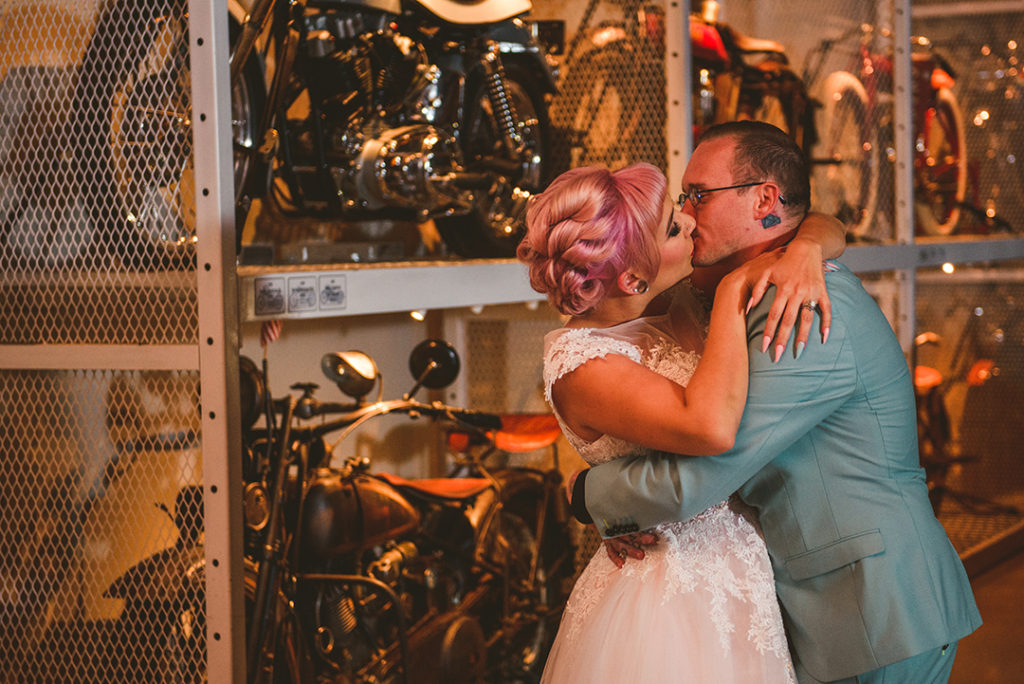 A bride and groom kissing during their first dance at the Warehouse 109 in Plainfield