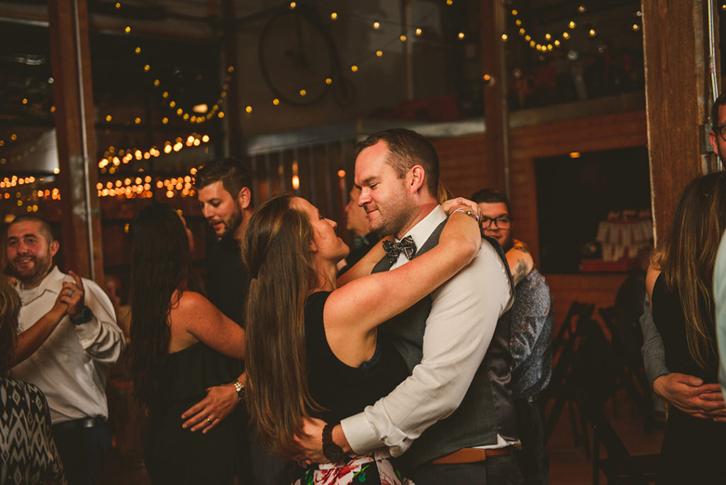 a man and a woman dancing at a reception at the Warehouse 109 in Plainfield