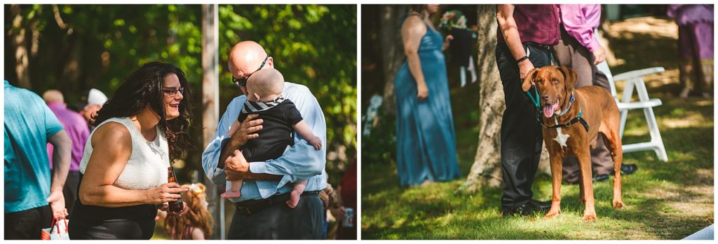 wedding guests socializing with a dog at Lake Bloomington right before a summer lake wedding