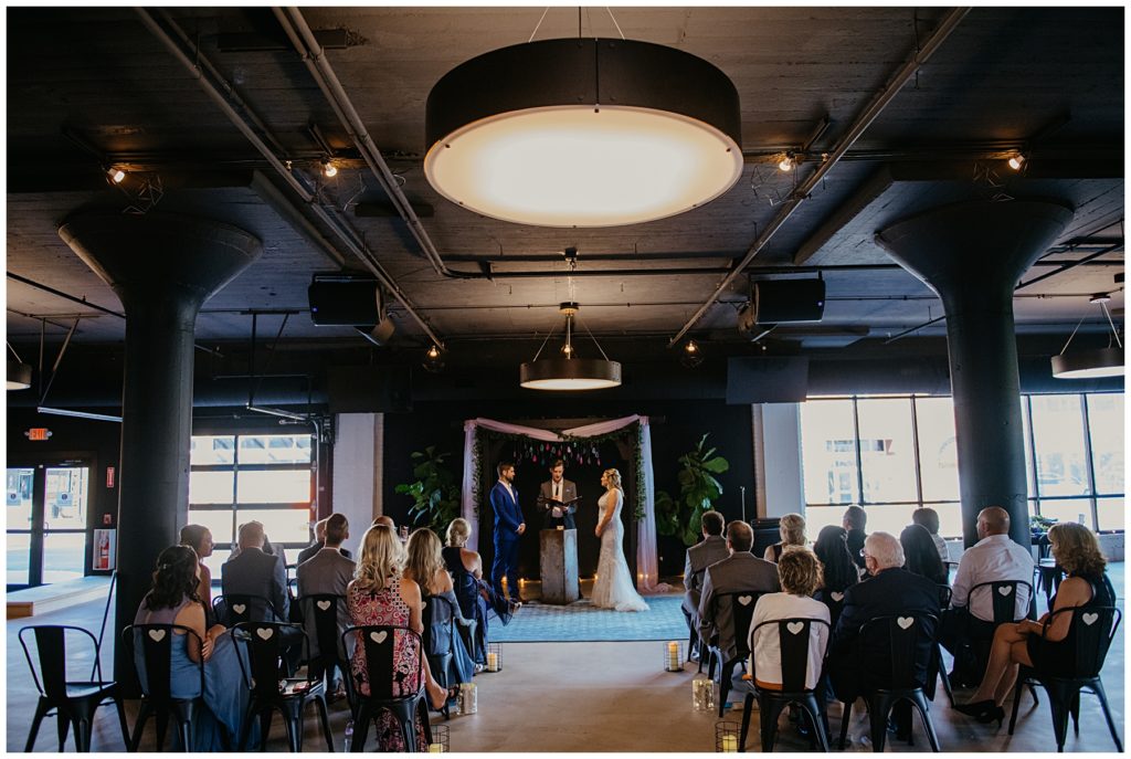 a small wedding taking place at Society 57 in downtown Aurora