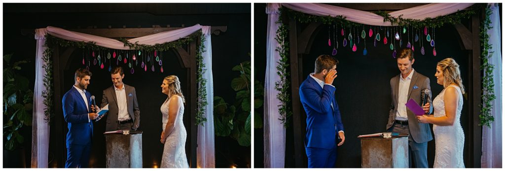 the groom brushing away a tear during their vows at Society 57 in Aurora
