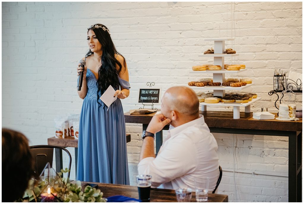 the maid of honor giving her speech at a wedding at Society 57