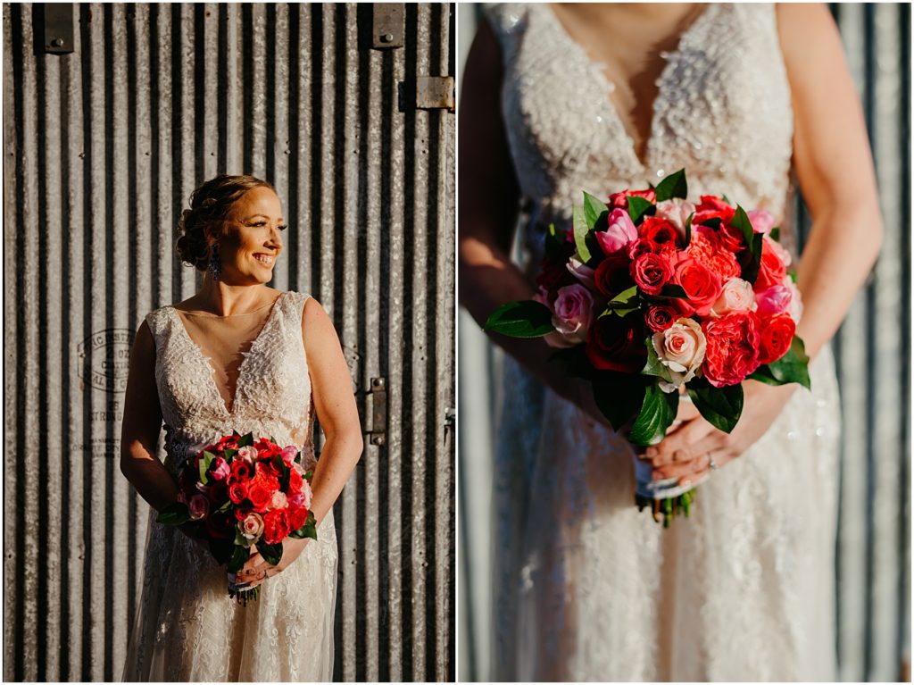the bride holding her colorful bouquet in front of metal walls at her warehouse wedding