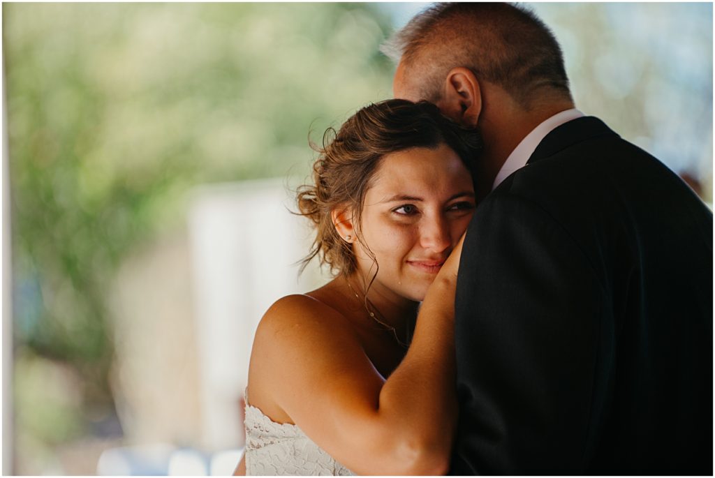 a bride crying during the father daughter dance 